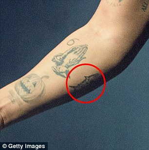 This is Drake’s arm. Credit: Getty